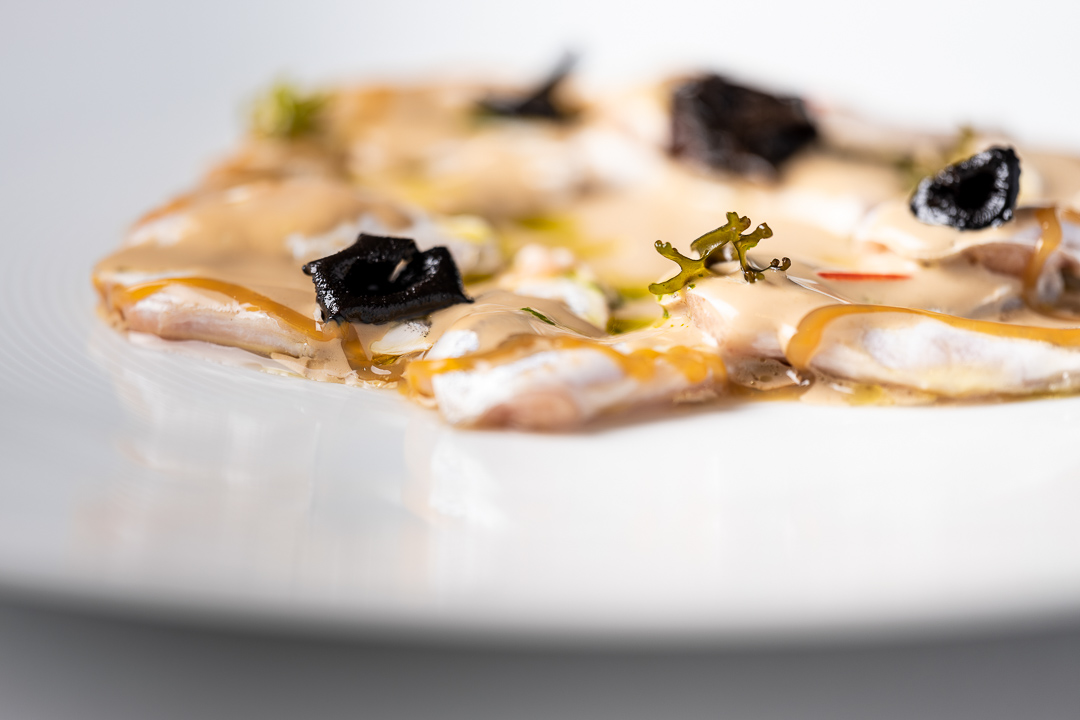 Enoteca Paco Pérez by Hungry for More. Details of the dish with hake fish by chef Xisco Simon.