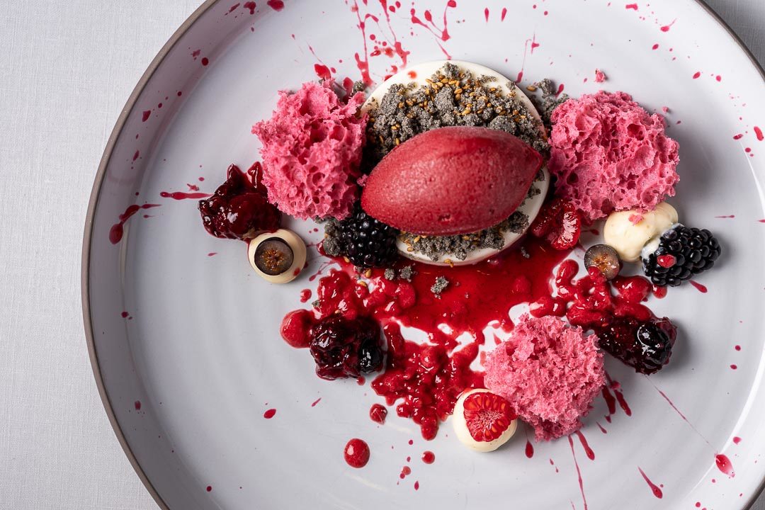 Enoteca Paco Pérez by Hungry for More. Top shot of the dessert with red fruit by chef Xisco Simon.
