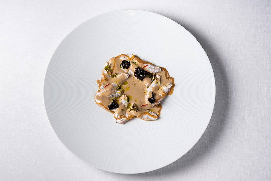 Enoteca Paco Pérez by Hungry for More. Top shot of the dish with hake fish by chef Xisco Simon.