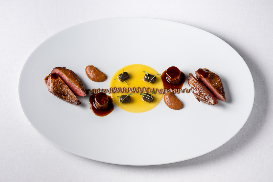 Enoteca Paco Pérez by Hungry for More. Top shot of the main course with pigeon by chef Xisco Simon.
