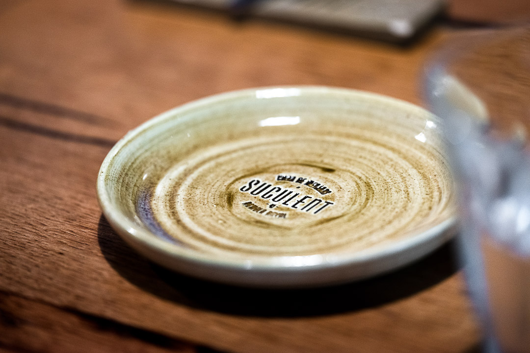 A plate with the restaurant's name on it