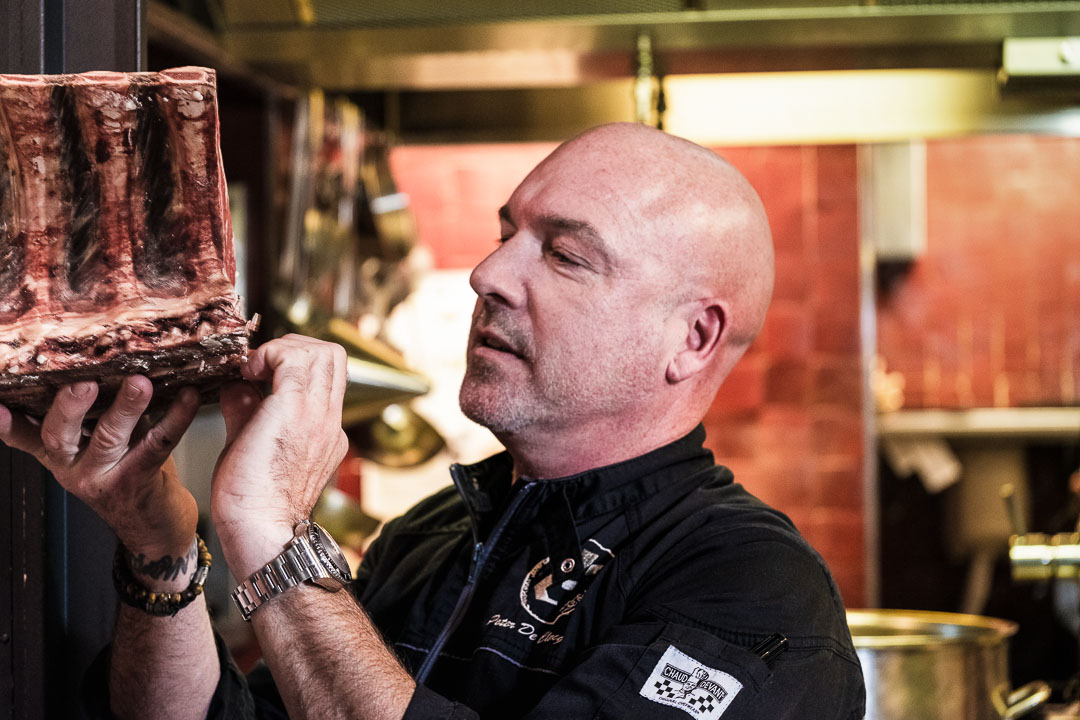 Elckerlijc by Hungry for More. Peter de Clercq selecting a slice of dry aged meat.