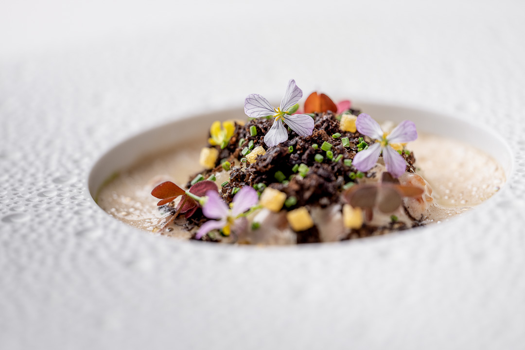Parkheuvel by Hungry For More - Chanterelles, mushroom cream sauce, parmesan foam, poached quail egg, Tasmanian winter truffle, chive oil, and fresh flowers and herbs.